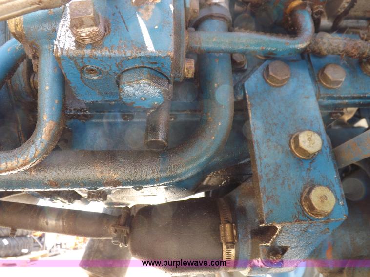 image for item H1809 1996 New Holland 1715 MFWD tractor