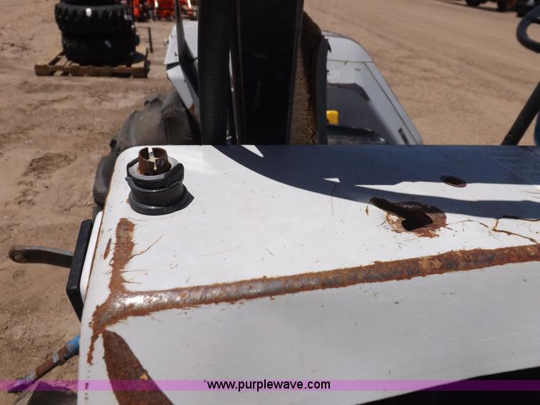 image for item H1809 1996 New Holland 1715 MFWD tractor