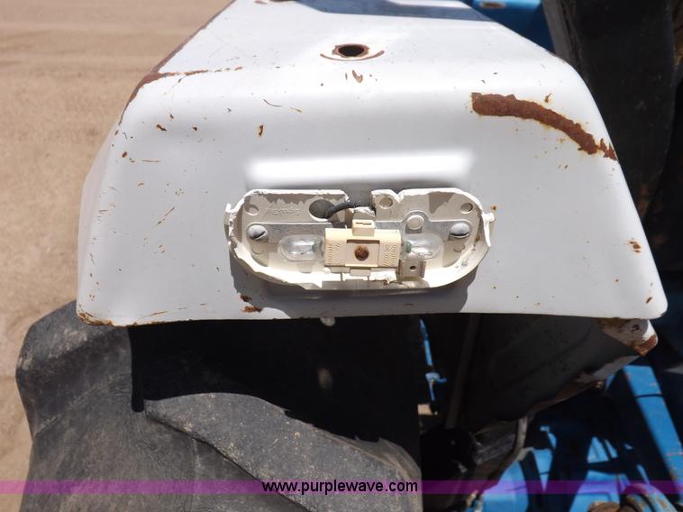 image for item H1809 1996 New Holland 1715 MFWD tractor