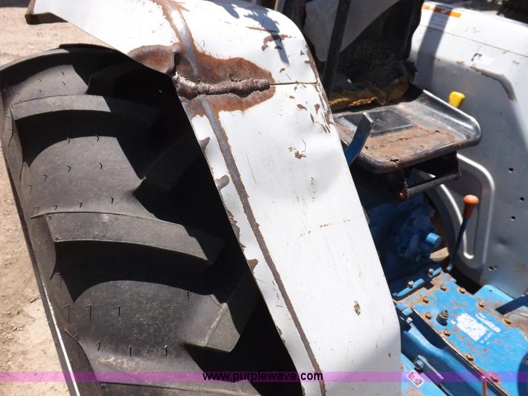 image for item H1809 1996 New Holland 1715 MFWD tractor