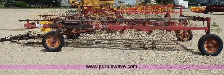 image for item I3586 1996 Gehl 520 12 wheel rake