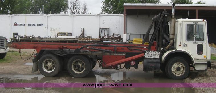 image for item H5424 1984 Mack MR686S roll-off truck