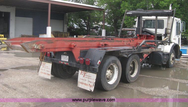 image for item H5424 1984 Mack MR686S roll-off truck