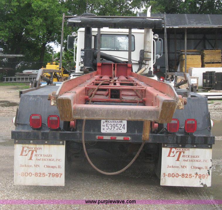 image for item H5424 1984 Mack MR686S roll-off truck