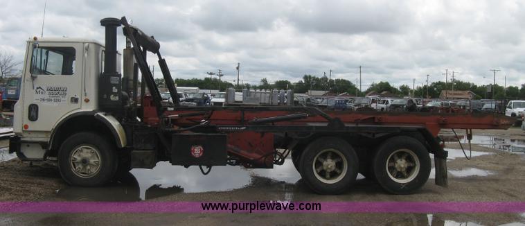 image for item H5424 1984 Mack MR686S roll-off truck