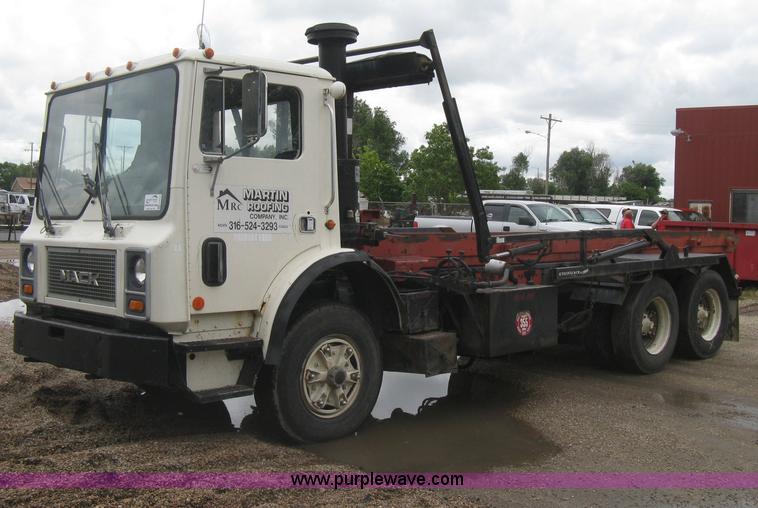image for item H5424 1984 Mack MR686S roll-off truck