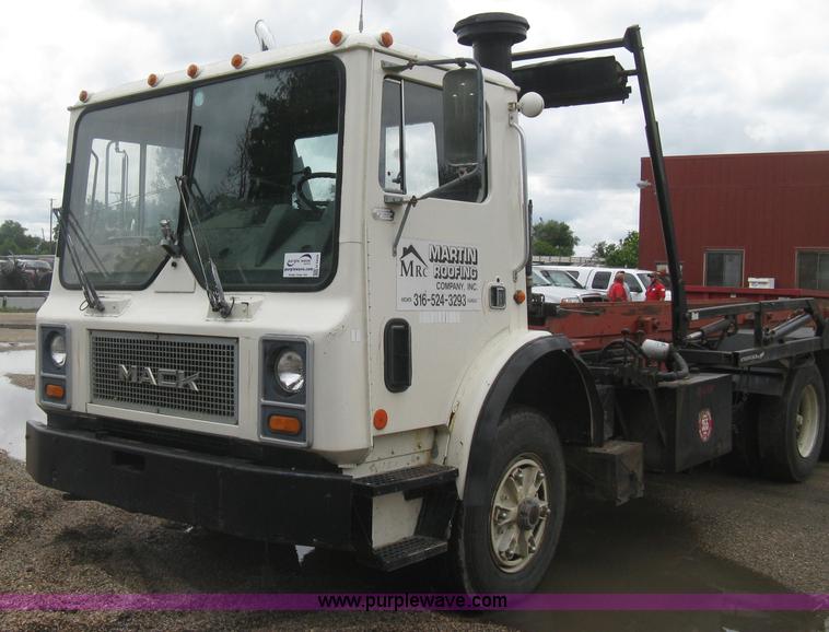 image for item H5424 1984 Mack MR686S roll-off truck