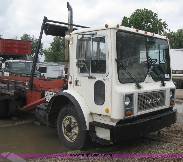 image for item H5424 1984 Mack MR686S roll-off truck