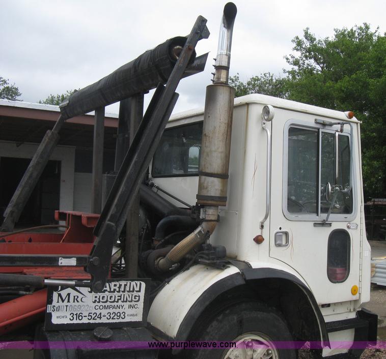 image for item H5424 1984 Mack MR686S roll-off truck
