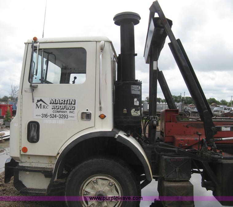 image for item H5424 1984 Mack MR686S roll-off truck