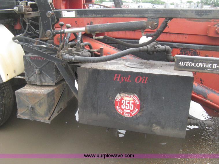 image for item H5424 1984 Mack MR686S roll-off truck