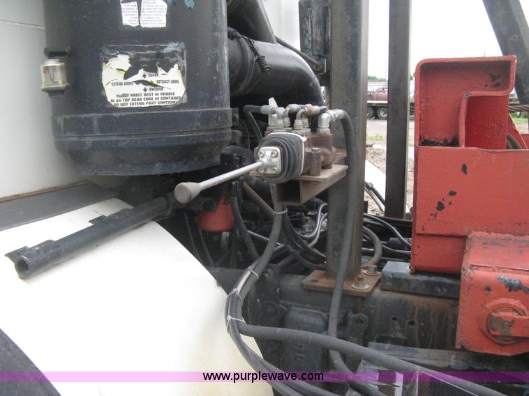 image for item H5424 1984 Mack MR686S roll-off truck