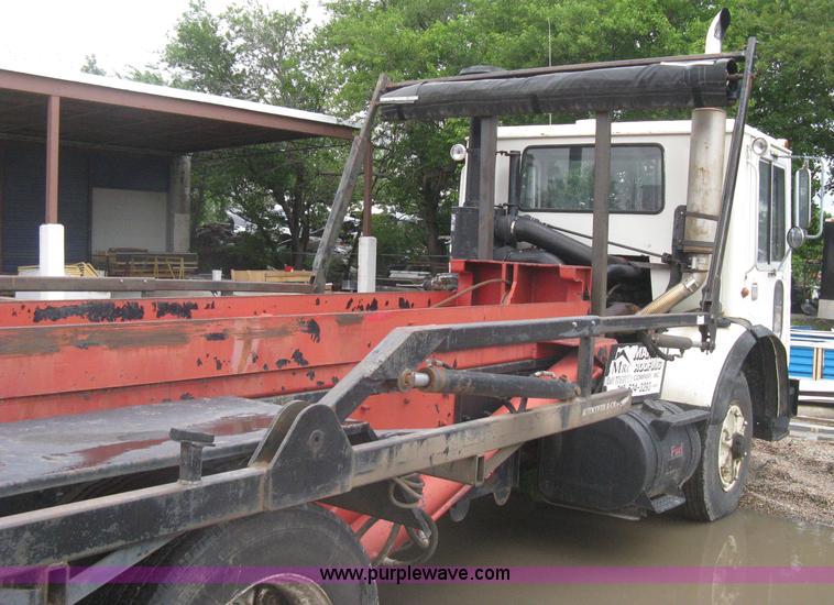 image for item H5424 1984 Mack MR686S roll-off truck