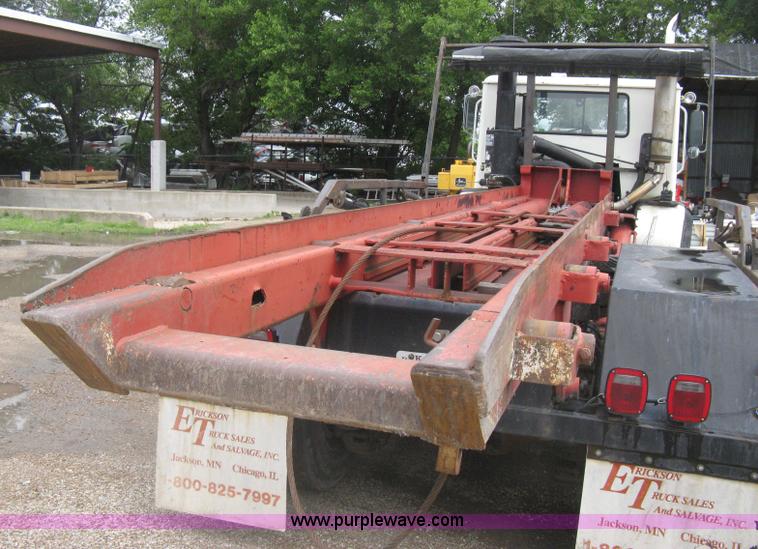 image for item H5424 1984 Mack MR686S roll-off truck