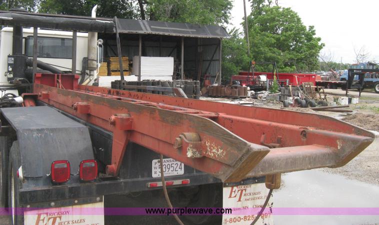 image for item H5424 1984 Mack MR686S roll-off truck