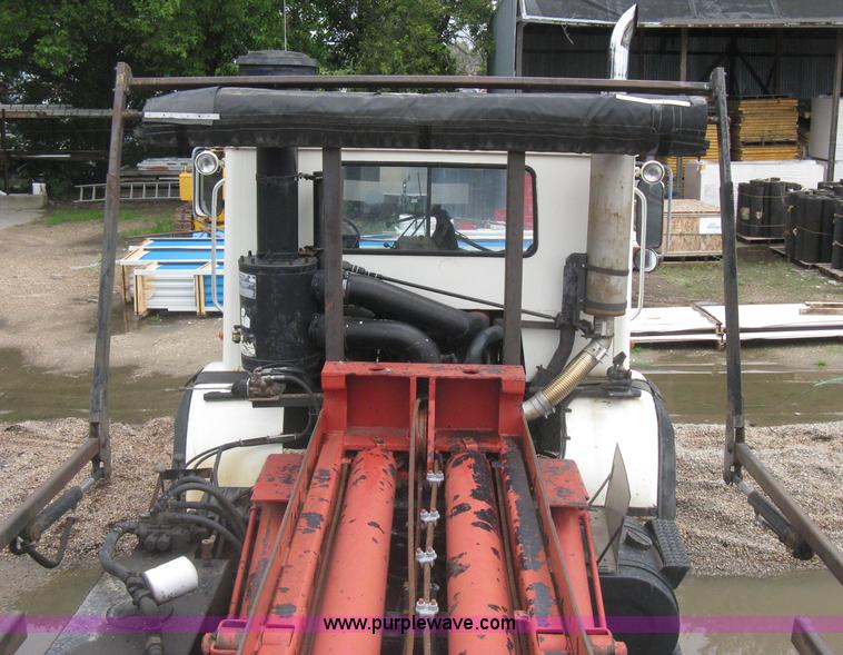 image for item H5424 1984 Mack MR686S roll-off truck