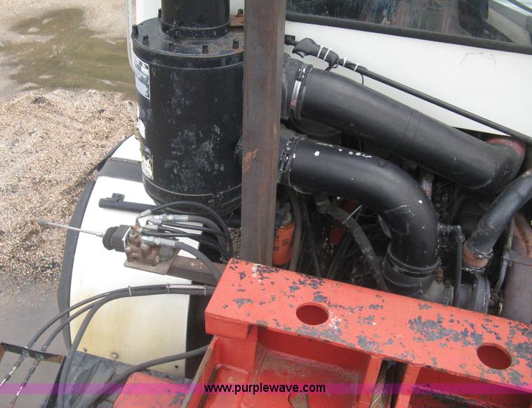 image for item H5424 1984 Mack MR686S roll-off truck