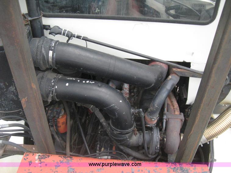 image for item H5424 1984 Mack MR686S roll-off truck