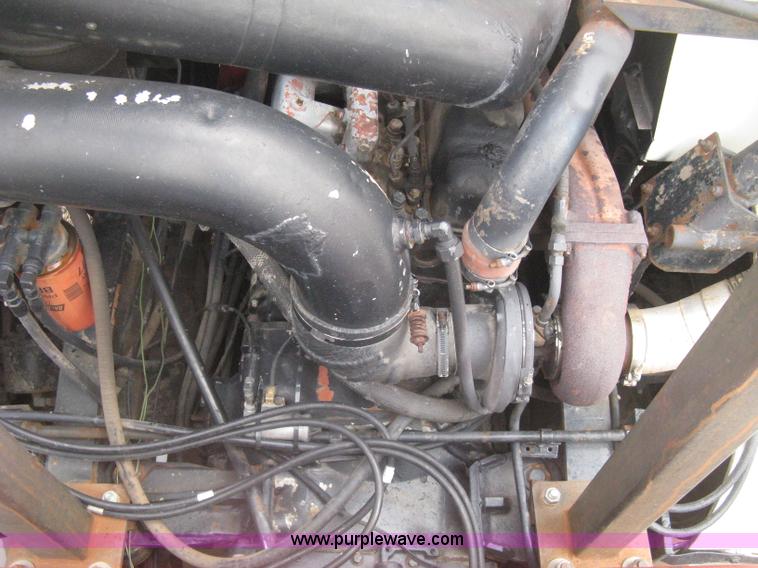 image for item H5424 1984 Mack MR686S roll-off truck