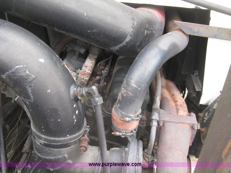 image for item H5424 1984 Mack MR686S roll-off truck