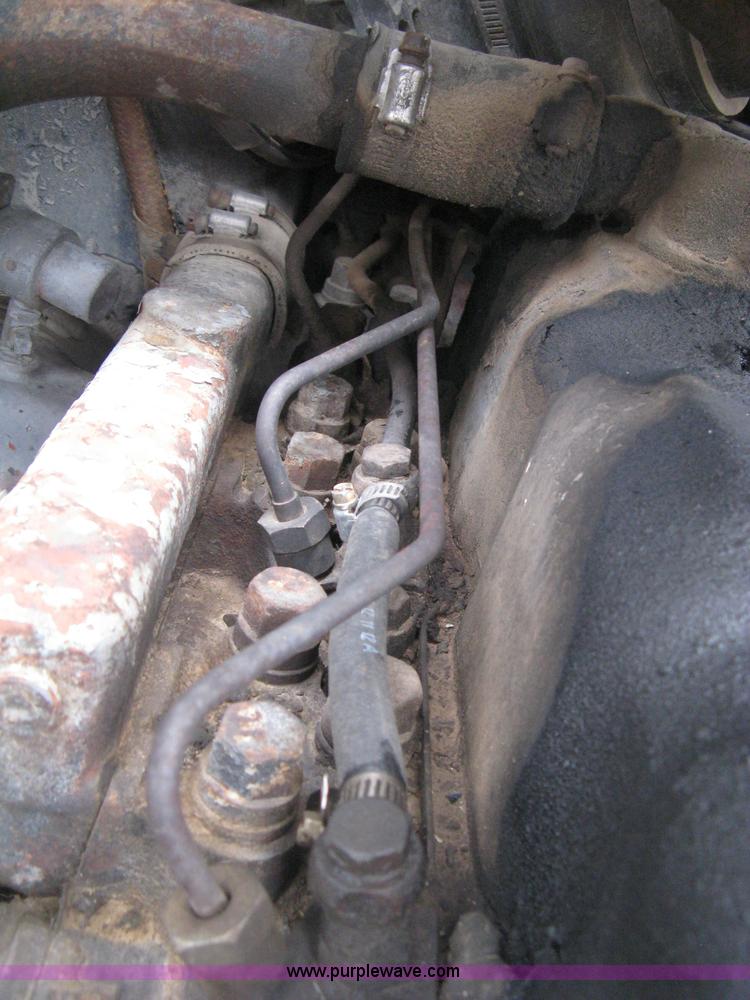 image for item H5424 1984 Mack MR686S roll-off truck