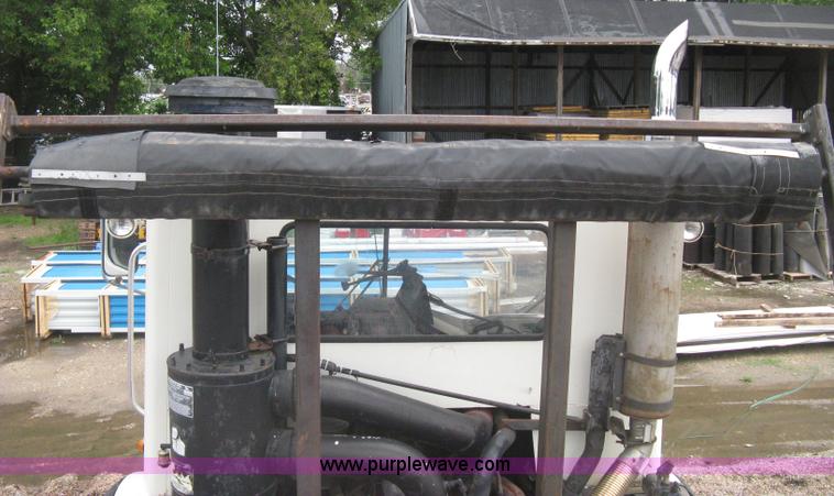 image for item H5424 1984 Mack MR686S roll-off truck