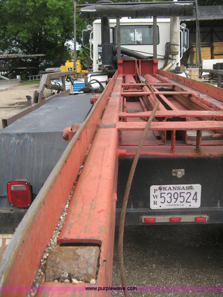 image for item H5424 1984 Mack MR686S roll-off truck