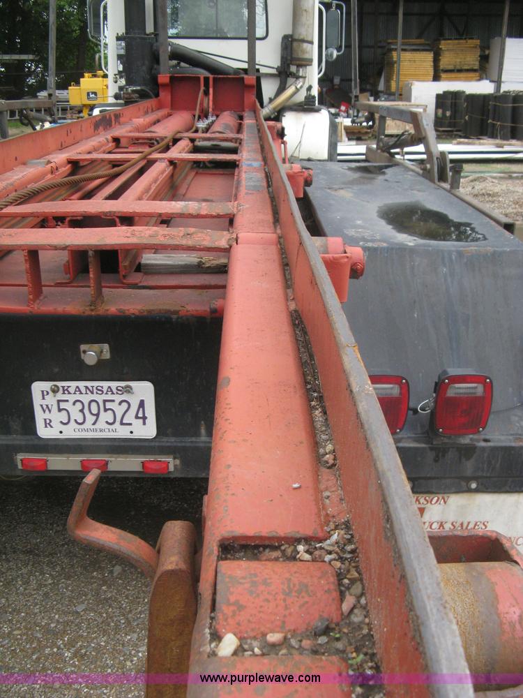 image for item H5424 1984 Mack MR686S roll-off truck