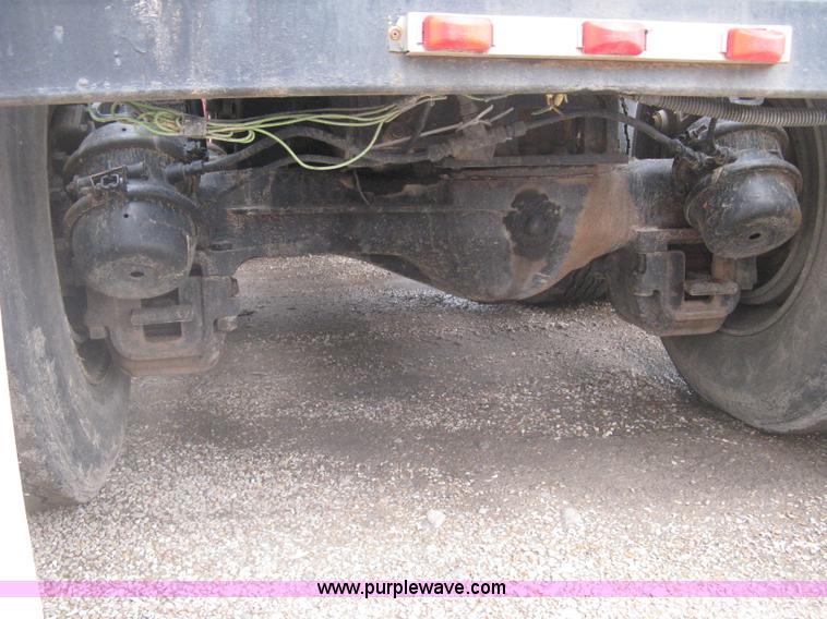 image for item H5424 1984 Mack MR686S roll-off truck