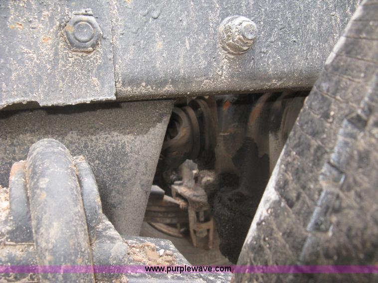 image for item H5424 1984 Mack MR686S roll-off truck