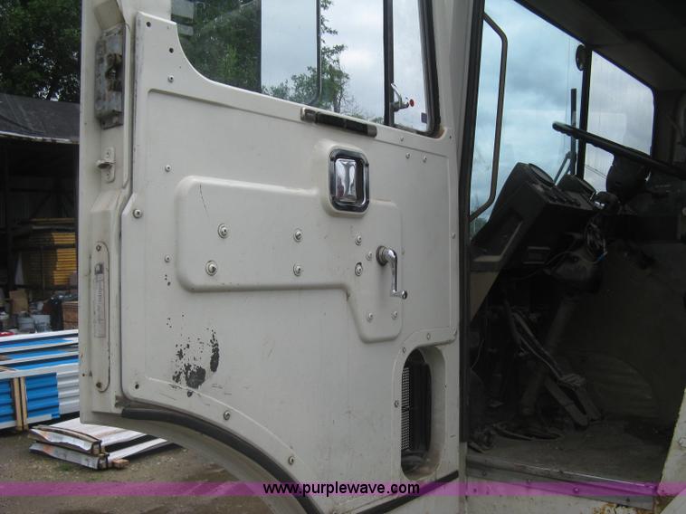 image for item H5424 1984 Mack MR686S roll-off truck