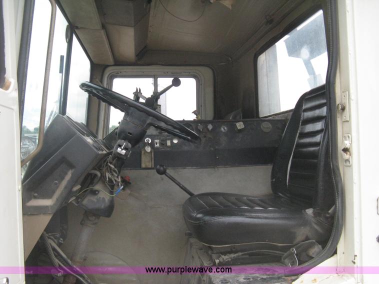 image for item H5424 1984 Mack MR686S roll-off truck