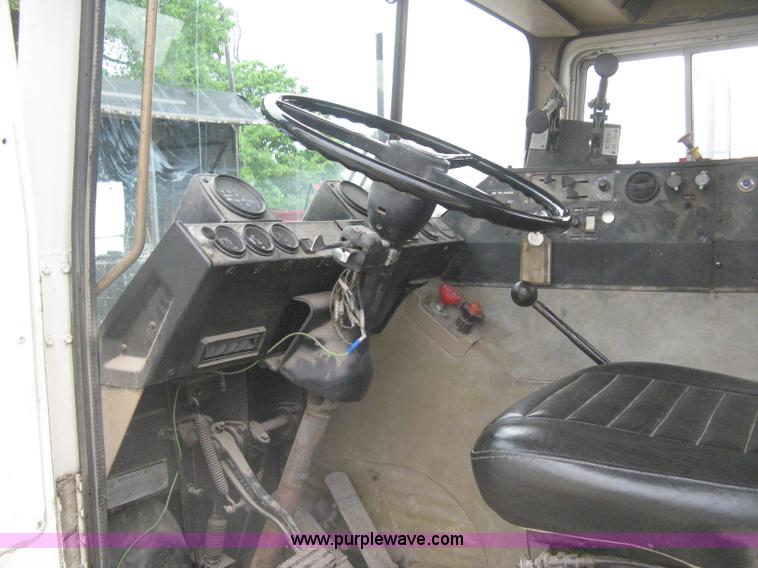 image for item H5424 1984 Mack MR686S roll-off truck