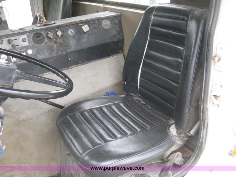 image for item H5424 1984 Mack MR686S roll-off truck