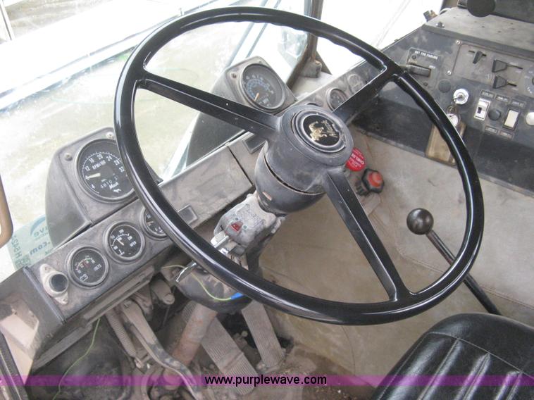 image for item H5424 1984 Mack MR686S roll-off truck