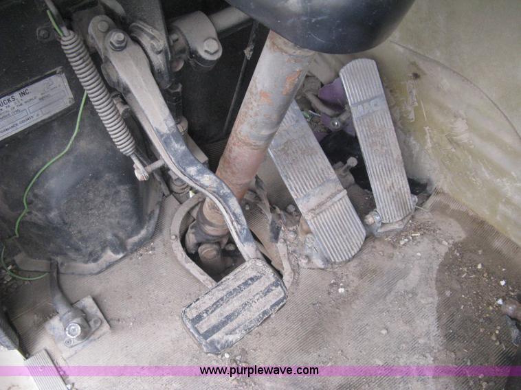 image for item H5424 1984 Mack MR686S roll-off truck