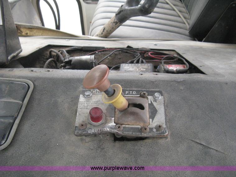 image for item H5424 1984 Mack MR686S roll-off truck