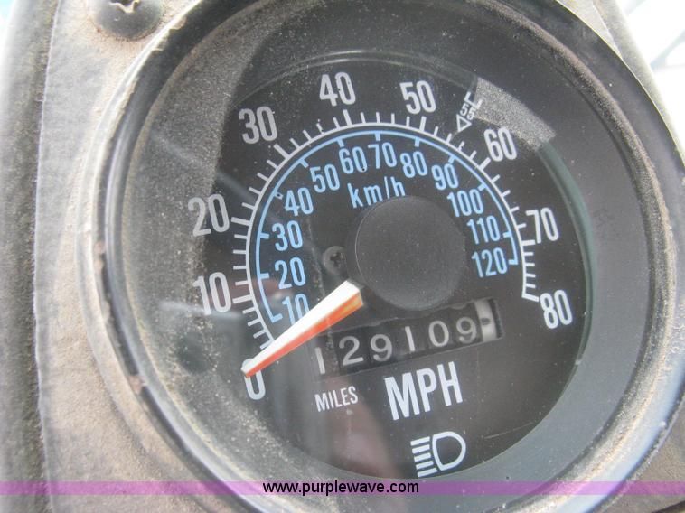 image for item H5424 1984 Mack MR686S roll-off truck