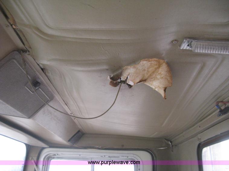 image for item H5424 1984 Mack MR686S roll-off truck