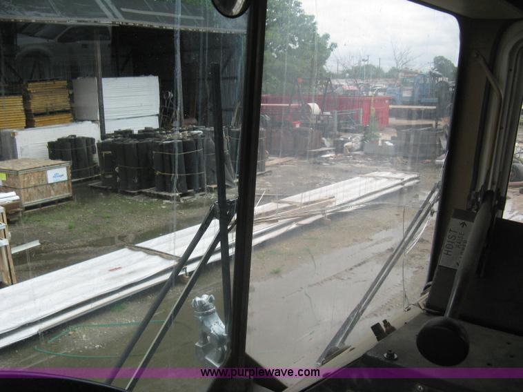 image for item H5424 1984 Mack MR686S roll-off truck