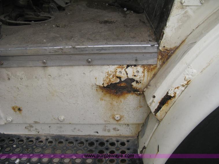 image for item H5424 1984 Mack MR686S roll-off truck