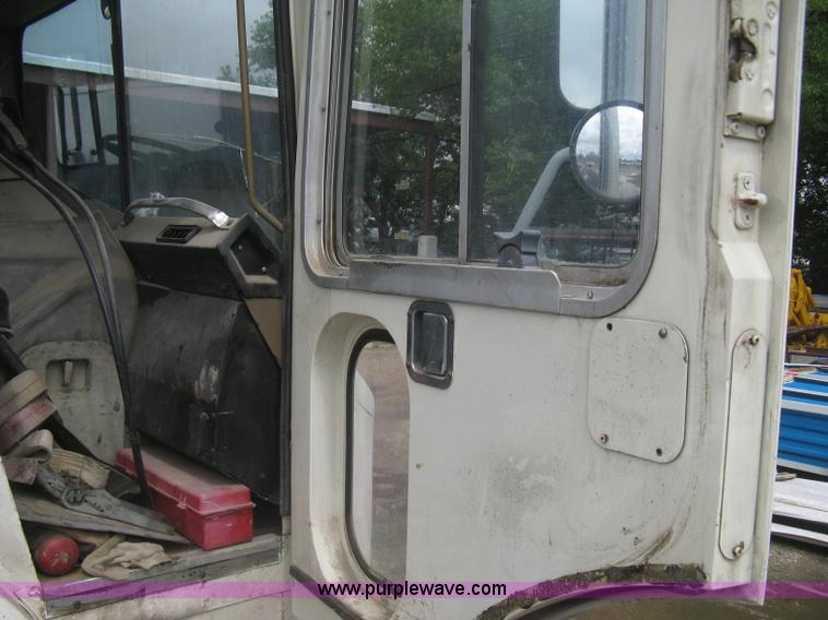 image for item H5424 1984 Mack MR686S roll-off truck