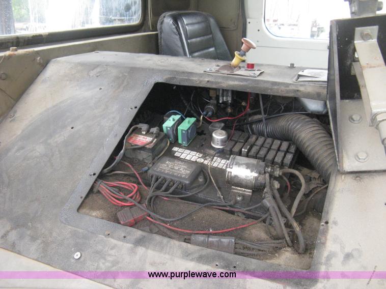 image for item H5424 1984 Mack MR686S roll-off truck