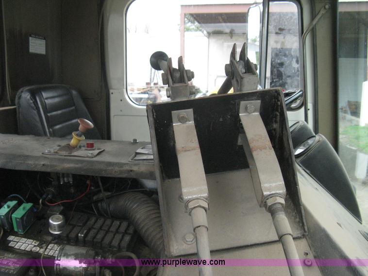 image for item H5424 1984 Mack MR686S roll-off truck