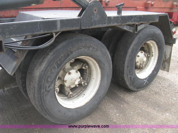 image for item H5424 1984 Mack MR686S roll-off truck