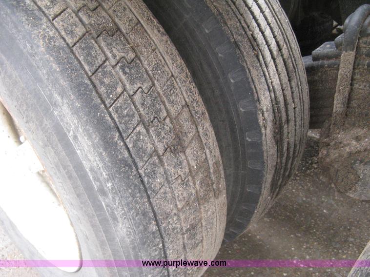 image for item H5424 1984 Mack MR686S roll-off truck