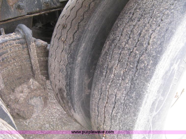 image for item H5424 1984 Mack MR686S roll-off truck