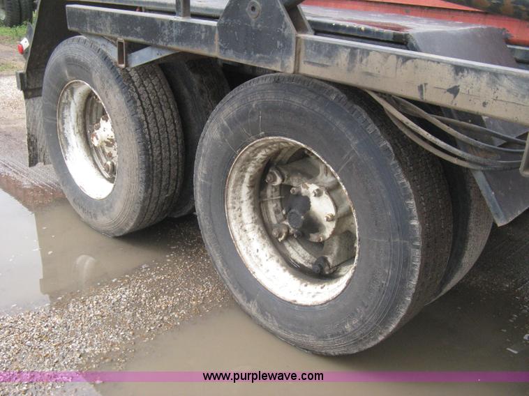 image for item H5424 1984 Mack MR686S roll-off truck