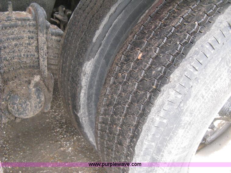 image for item H5424 1984 Mack MR686S roll-off truck