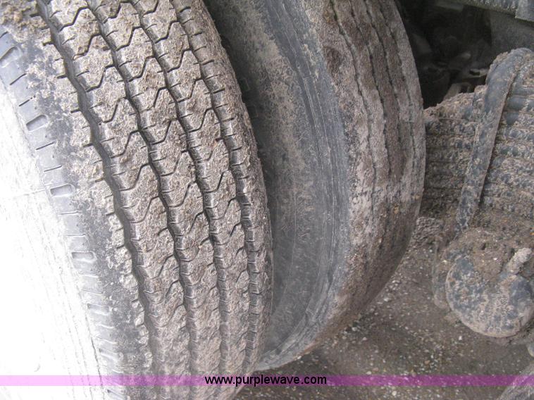 image for item H5424 1984 Mack MR686S roll-off truck